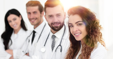 portrait of female doctors with colleagues