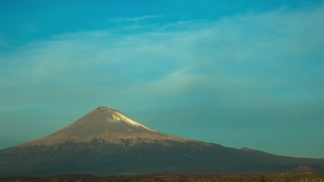incredible time lapse of the popocatepetl volcano and full moon at sunrise