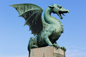 Ljubliana, Slovenia. Statue on the Dragon Bridge, Zmajski Most. © PhotoEdit