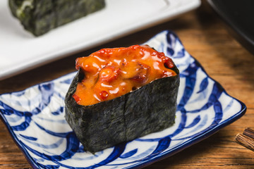 A plate of sushi on the board, Japanese food