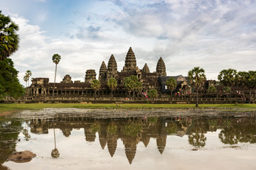 Fototapeta na wymiar Reflection of beautiful Angkor Wat complex in Cambodia