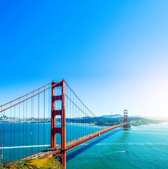 Red long bridge over the sea bay. The Golden Gate, San Francisco