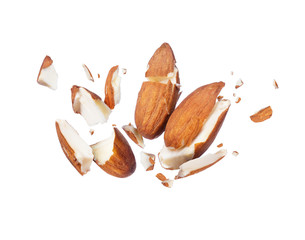 Almonds is torn to pieces close-up, isolated on white background