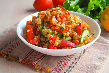 Fresh lunch salad with vegetables and  bulgur.

