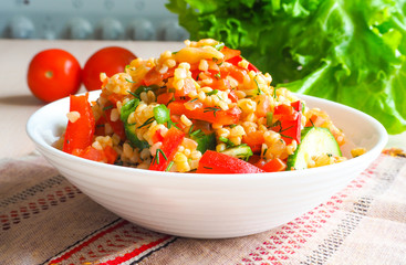 Fresh lunch salad with vegetables and  bulgur.

