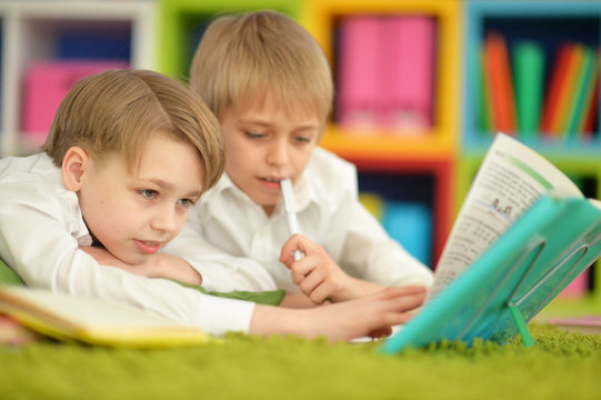 Two boys reading