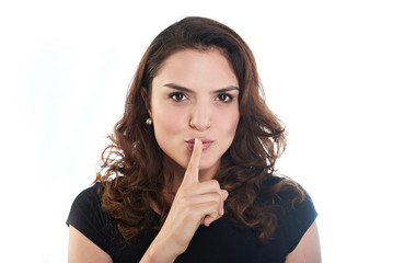 Naklejka premium Brunette woman show silence sign