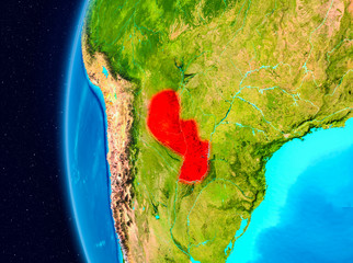 Space view of Paraguay in red
