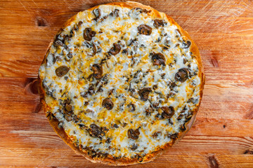 pizza on wooden background