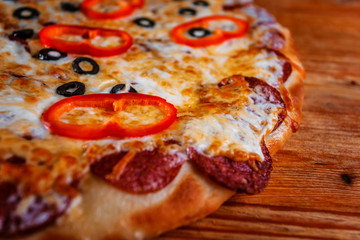 pizza on wooden background