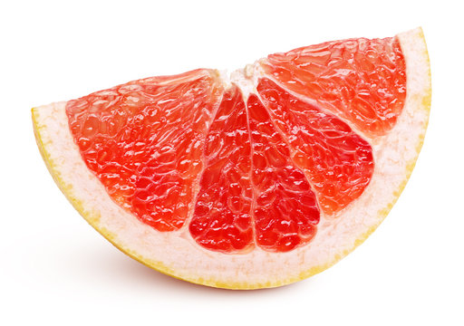 Ripe slice of pink grapefruit citrus fruit isolated on white background with clipping path