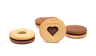 Chocolate heart in round biscuit isolated on white background