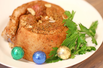 food baked fat in spices on a plate