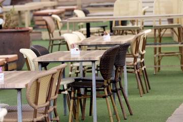 chairs and tables in a cafe, restaurant
