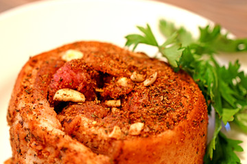 food baked fat in spices on a plate