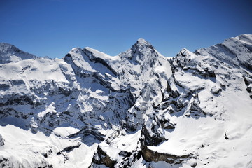 Fototapeta na wymiar Snow tops of the Swiss Alps
