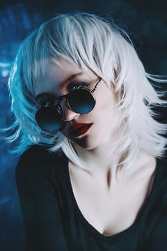 blonde in stylish sunglasses