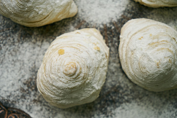 Novruz tray with Azerbaijan traditional pastry cookie Badambura on wooden rustic table background. Dessert for the Azerbaijani national holiday Novruz Bayram