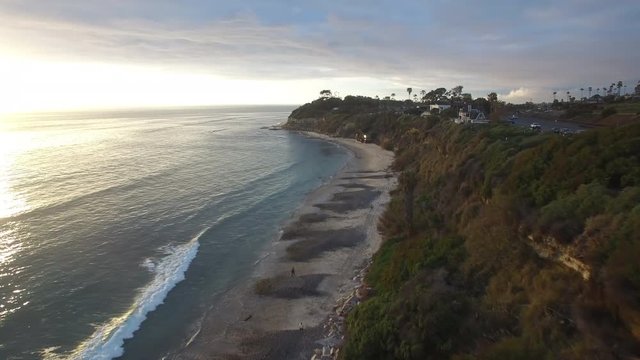 A beautiful aerial above the California coastline north of San Diego.