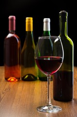 Bottles and Glass of Red Wine