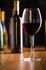 Bottles and Glass of Red Wine