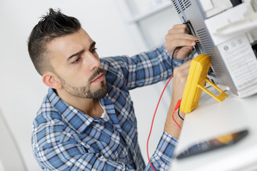 technician measuring devices