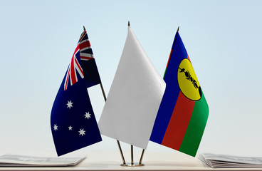Flags of Australia and New Caledonia with a white flag in the middle
