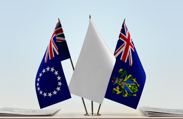 Flags of Cook Islands and Pitcairn Island with a white flag in the middle