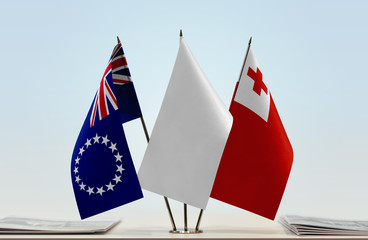 Flags of Cook Islands and Tonga with a white flag in the middle