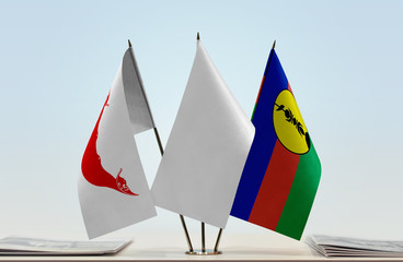 Flags of Easter Island and New Caledonia with a white flag in the middle