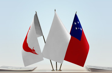 Flags of Easter Island and Samoa with a white flag in the middle