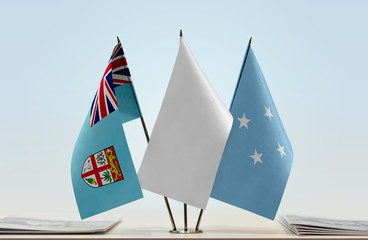 Flags of Fiji and Federated States of Micronesia with a white flag in the middle