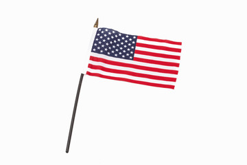 A studio shot of a small American flag