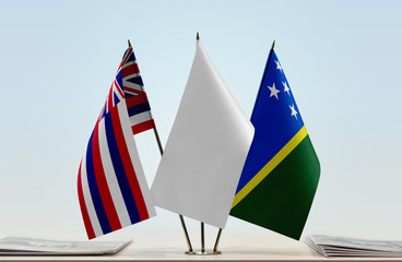 Flags of Hawaii and Solomon Islands with a white flag in the middle