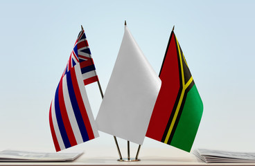 Flags of Hawaii and Vanuatu with a white flag in the middle