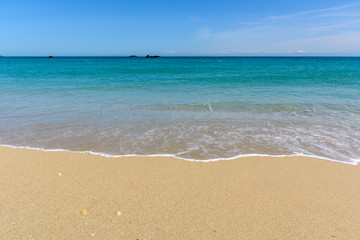 Fototapeta na wymiar sand beach water blue