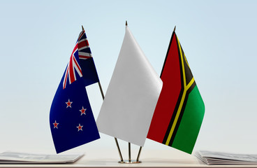 Flags of New Zealand and Vanuatu with a white flag in the middle