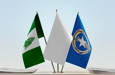 Flags of Norfolk Island and Northern Mariana Islands with a white flag in the middle