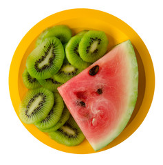 watermelon and kiwi sliced on a plate © vitalily_73
