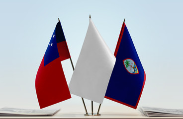 Flags of Samoa and Guam with a white flag in the middle