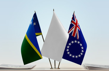 Flags of Solomon Islands and Cook Islands with a white flag in the middle