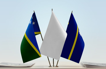 Flags of Solomon Islands and Nauru with a white flag in the middle