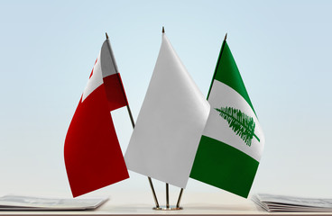 Flags of Tonga and Norfolk Island with a white flag in the middle