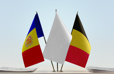 Flags of Andorra and Belgium with a white flag in the middle