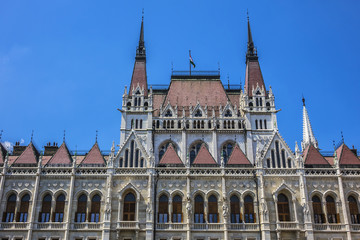 Fototapeta premium Famous Hungarian Parliament Building (or House of Nation, 1896) - one of Europe's oldest legislative buildings, is world's third largest Parliament building and popular tourist destination of Budapest