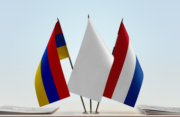 Flags of Armenia and Netherlands with a white flag in the middle