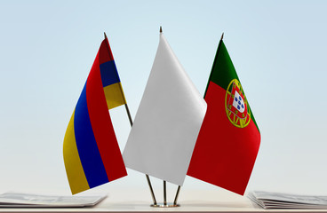 Flags of Armenia and Portugal with a white flag in the middle