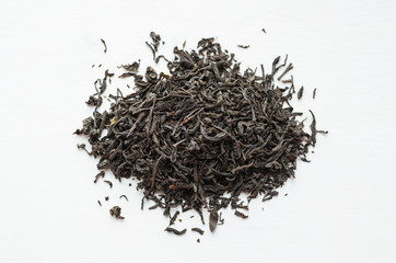 Dry black tea leaves heap