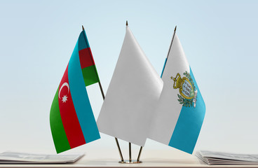 Flags of Azerbaijan and San Marino with a white flag in the middle