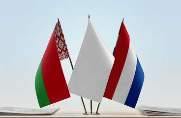Flags of Belarus and Netherlands with a white flag in the middle
